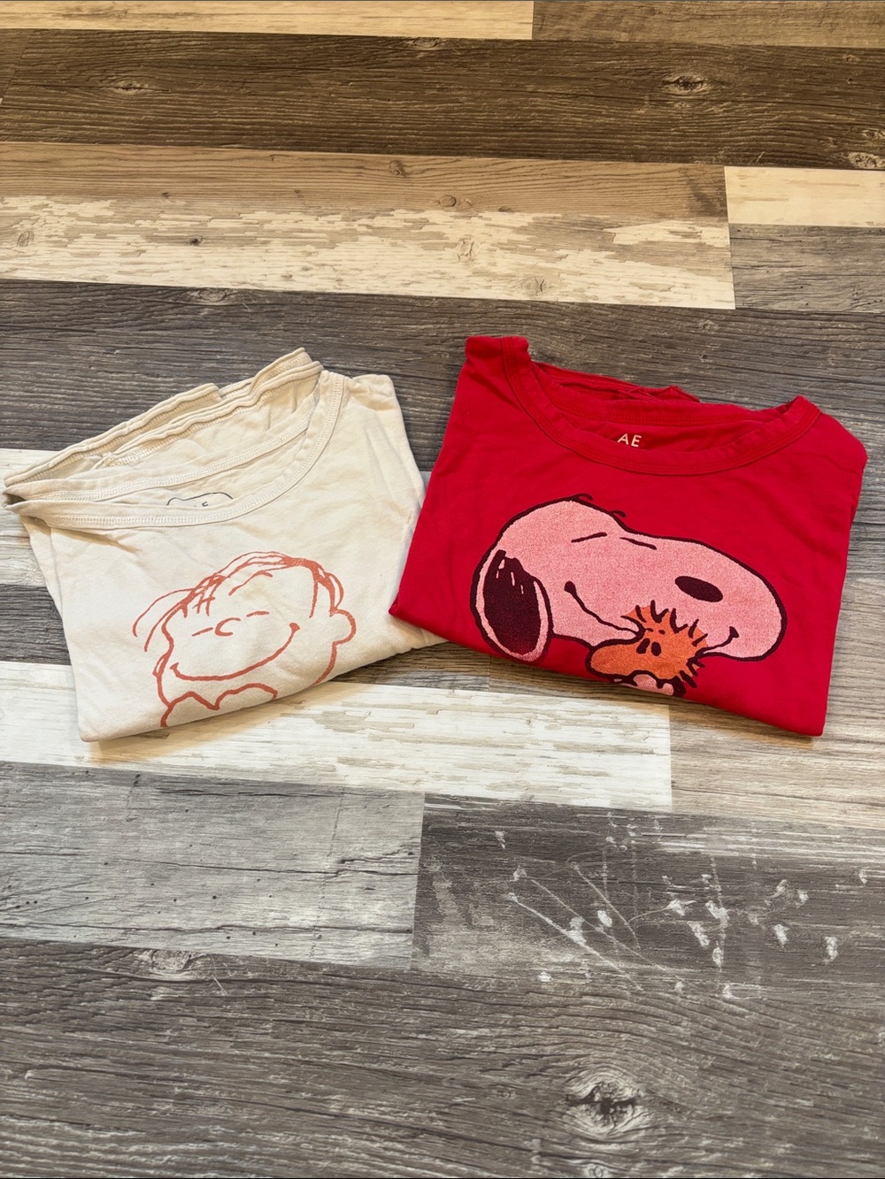 American Eagle Outfitters Kids Red Snoopy & Cream Charlie Brown Graphic Tees